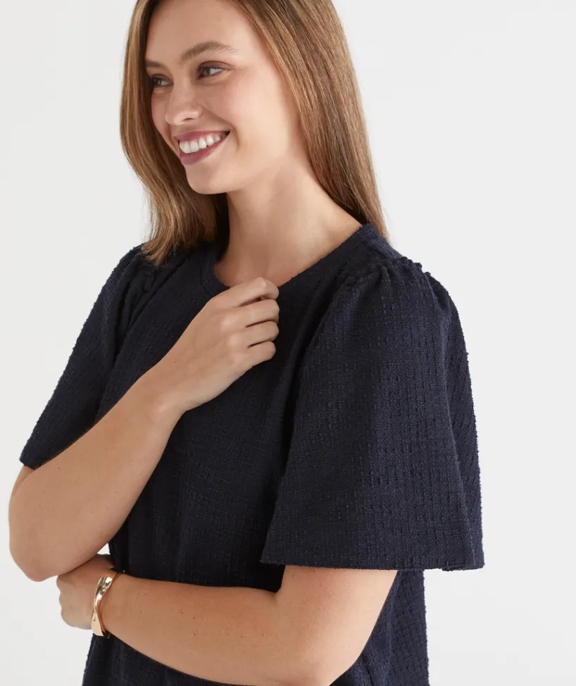 Sussan Dresses>Textured Short Sleeve Flutter Dress